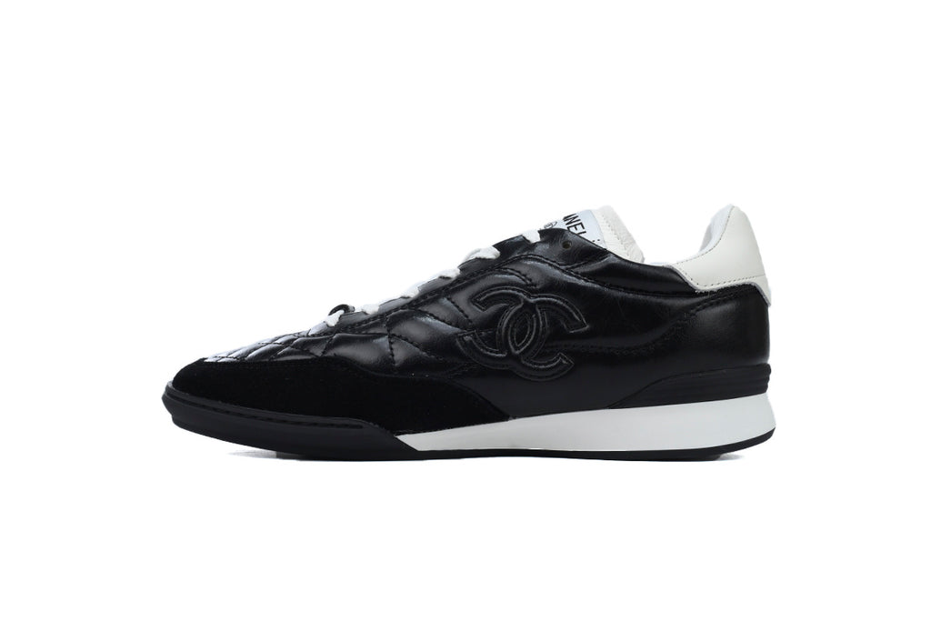Chanel Black Quilted Suede Low-Top Sneakers